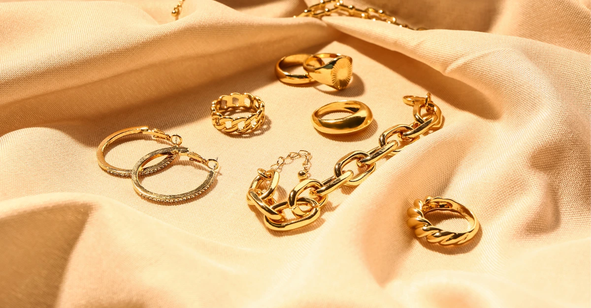Brass jewelry collection on fabric